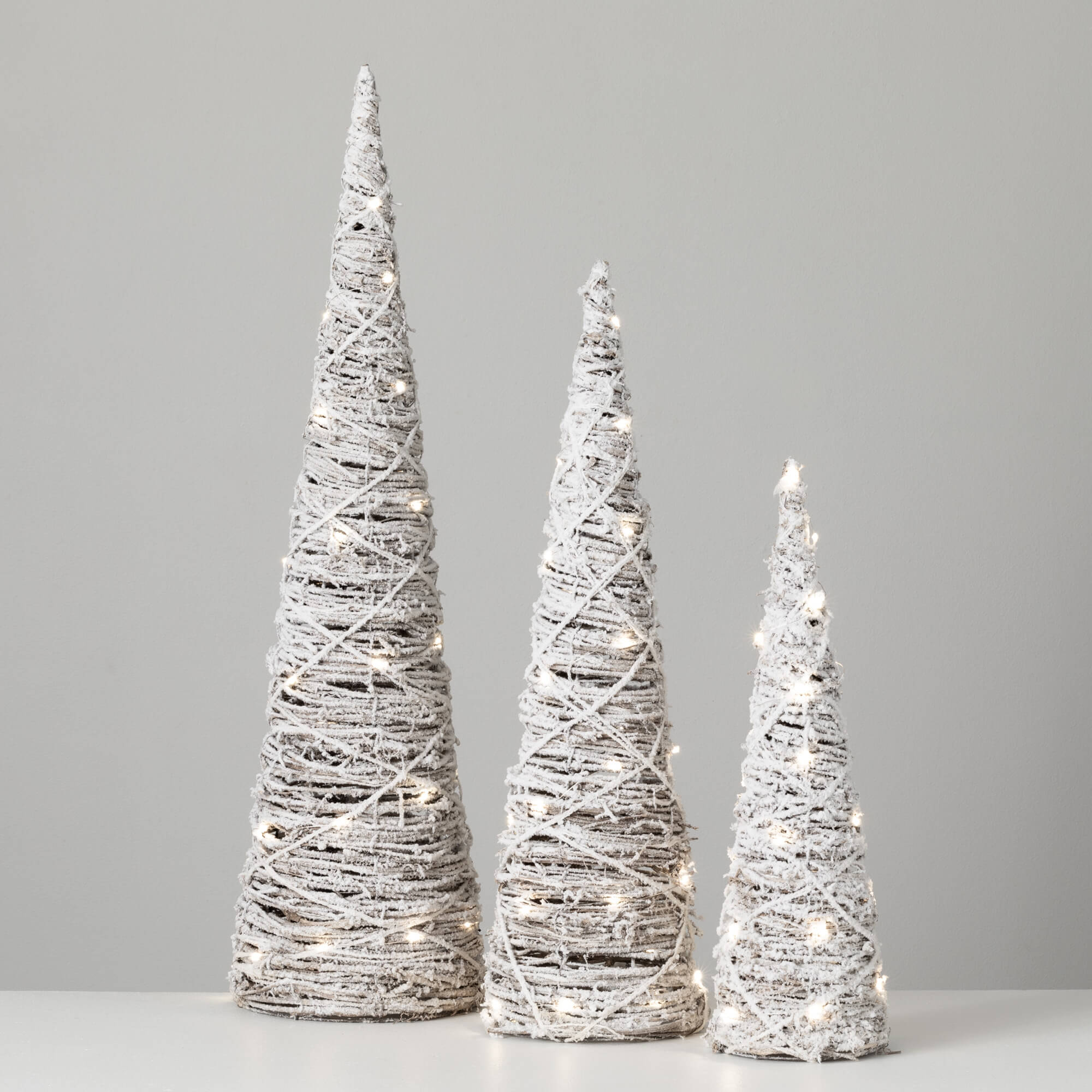 LIGHTED FROSTED CONE TREES